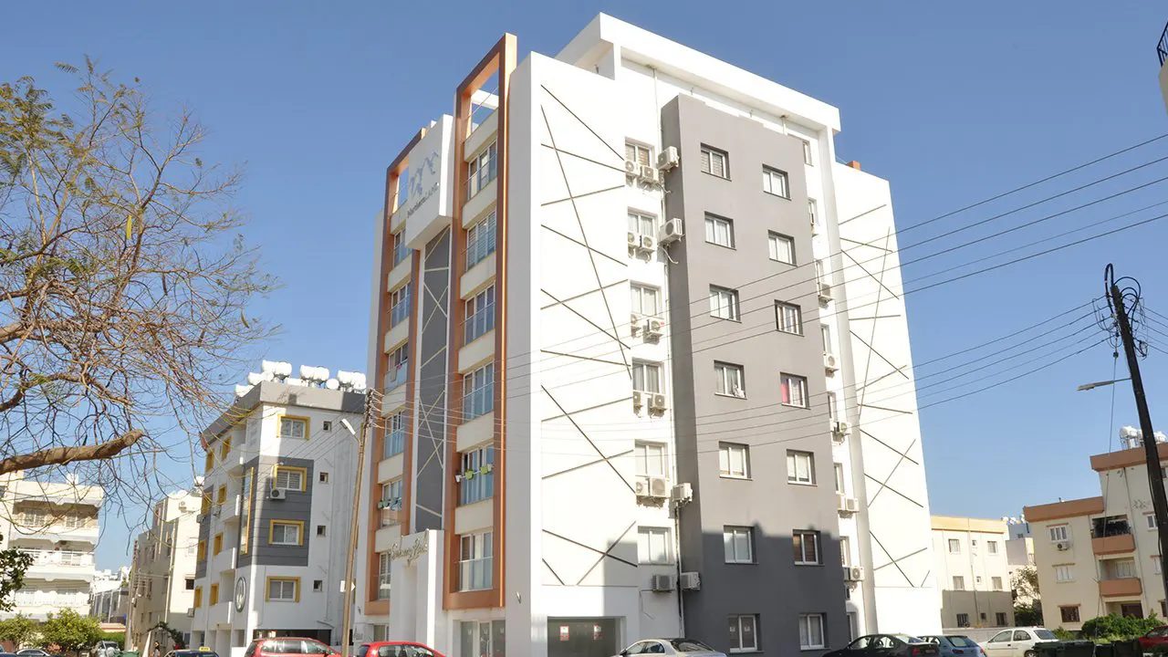 Subway Park apartment block seen from the side, with grey and white facade