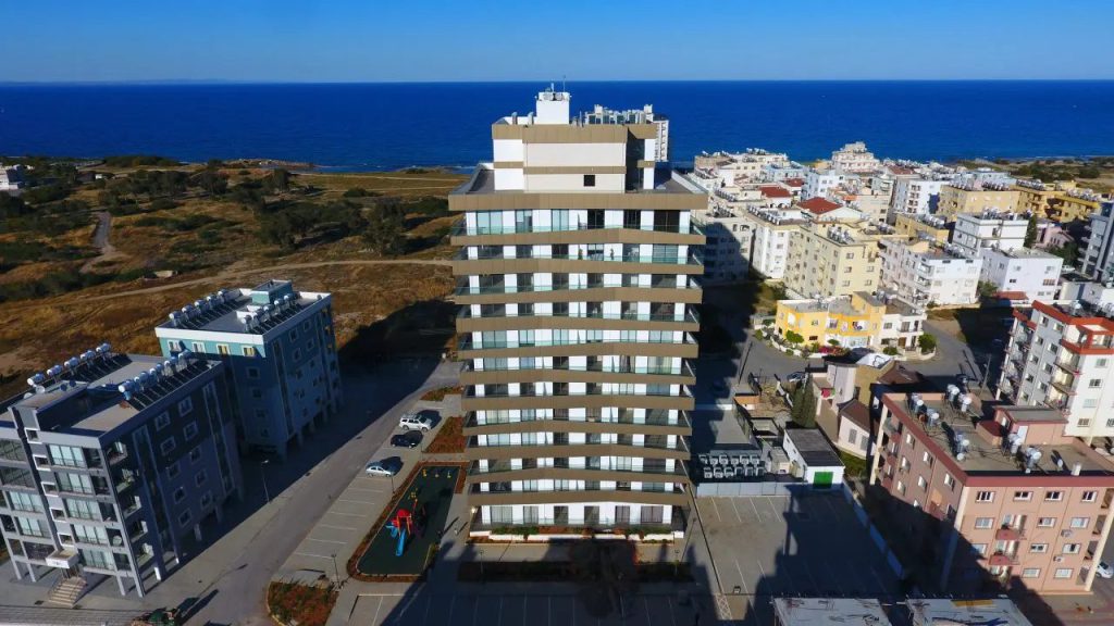 Via Park Famagusta apartment tower beside the coast, aerial view