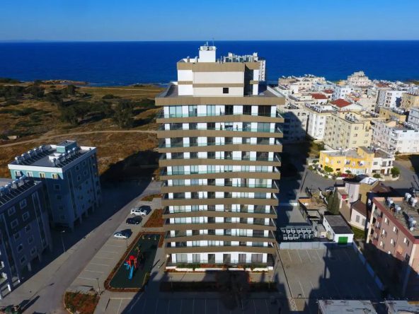 Aerial view of the Viapark tower beside the coast with surrounding apartment blocks