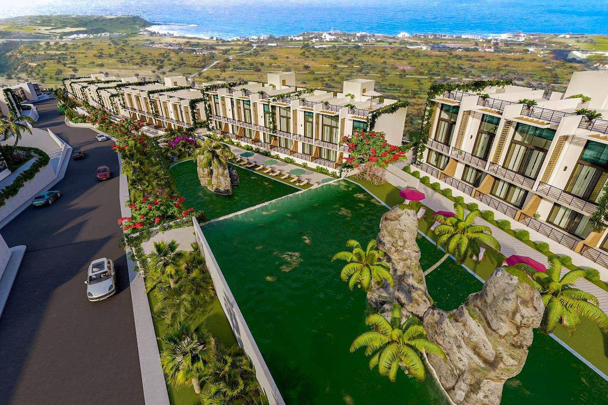 Aerial render of Phuket H&W Resort terraced blocks and lawn above the coast
