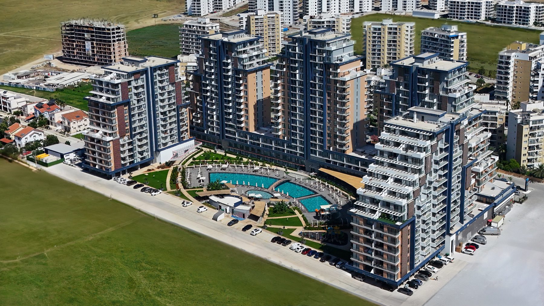 Aerial view of Riverside Life Residence towers and pool terrace