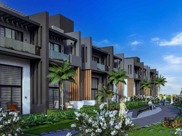 Render of Sky Diora townhouse facades along a landscaped garden path