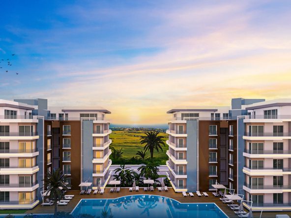 Render of The Blue Residence apartment blocks above the pool at sunset